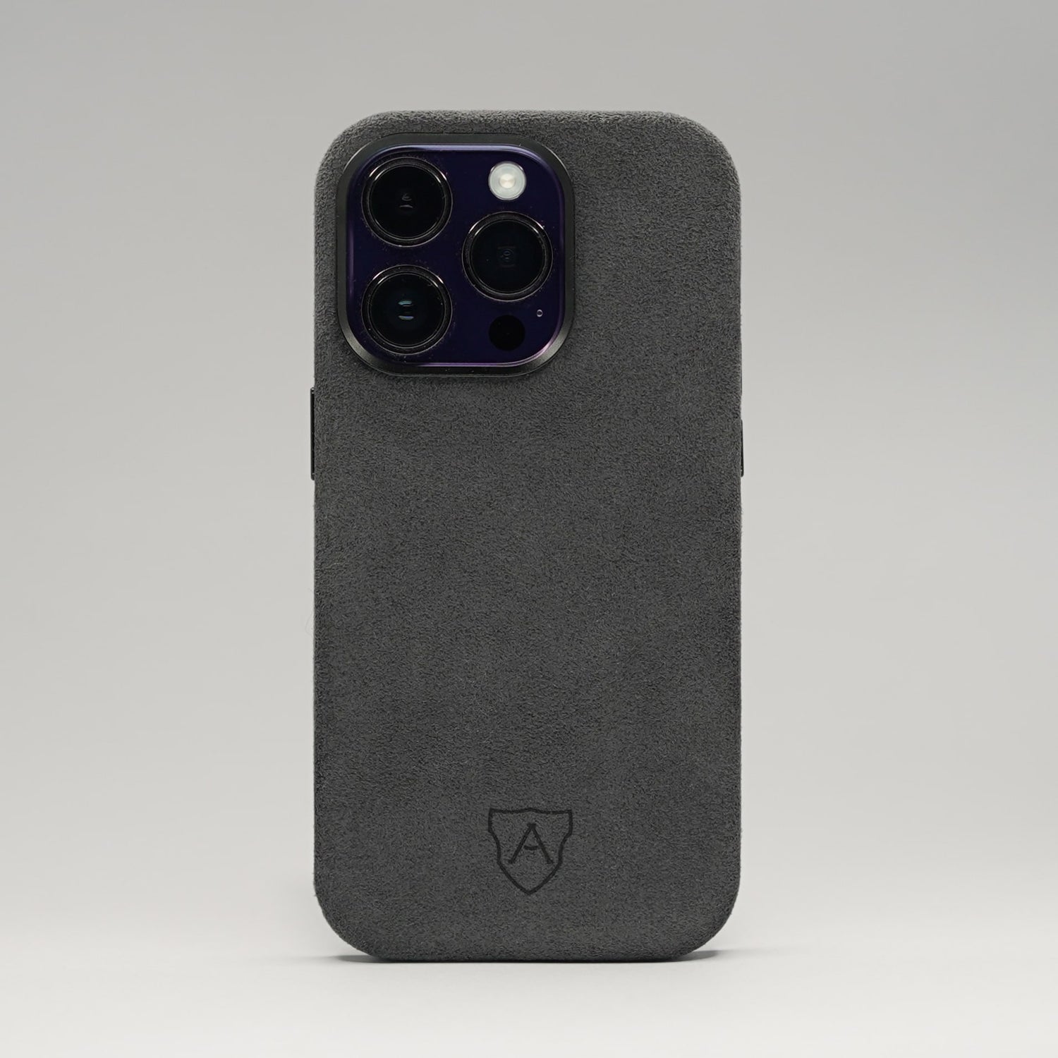 A premium black Alcantara iPhone case with a camera cutout and metal buttons, featuring a sleek and luxurious design.
