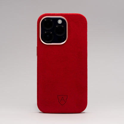A premium red Alcantara iPhone case with a camera cutout and metal buttons, featuring a sleek and luxurious design.