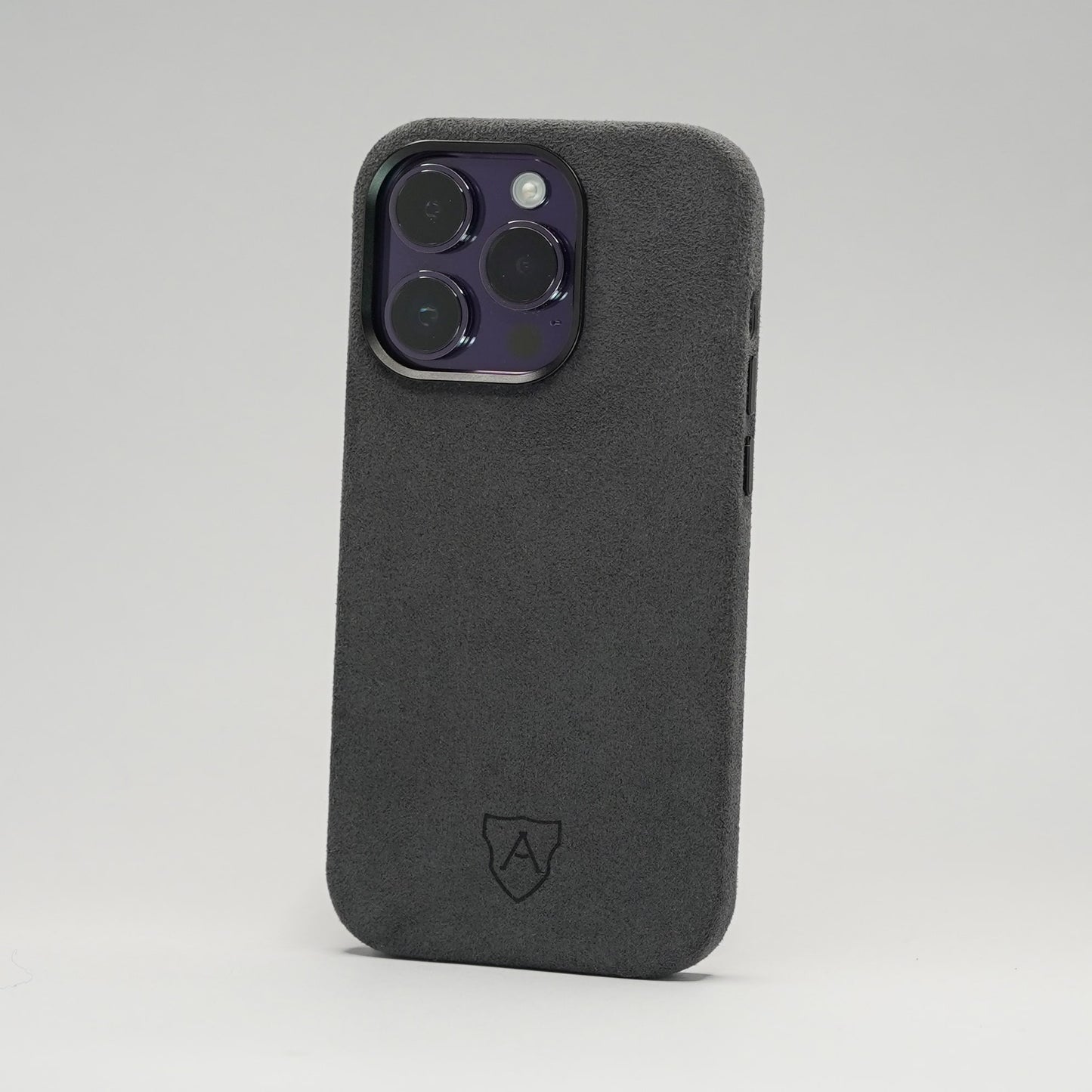 Dark gray phone case on a light gray background