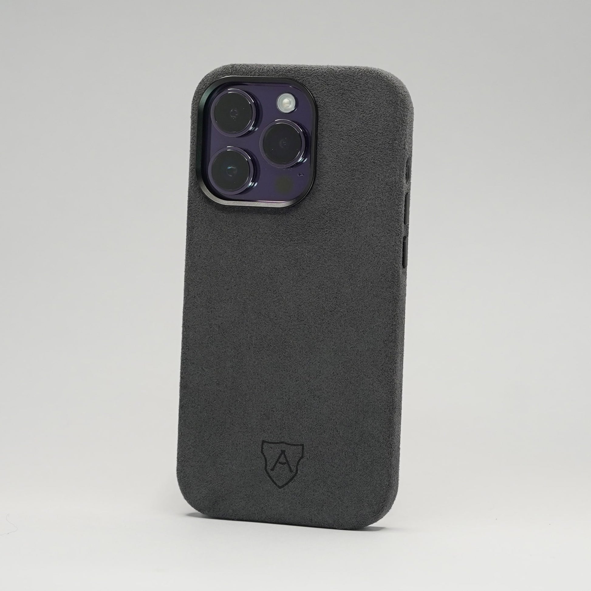 Dark gray phone case on a light gray background